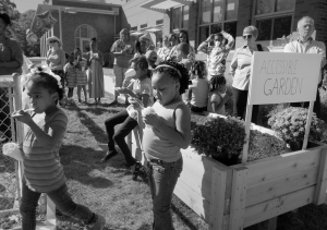 Children at ribbon cutting ceremony for their school vegetable garden - St. Louis, Mo